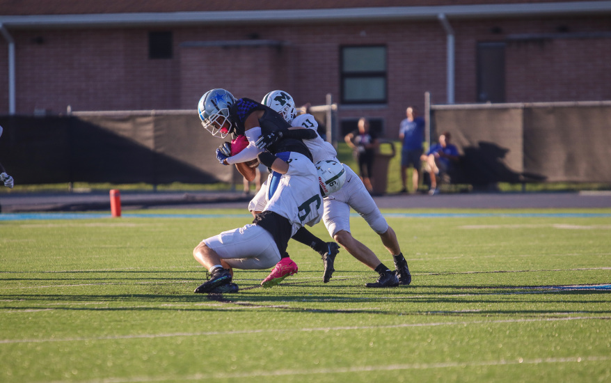 Tackle during football game